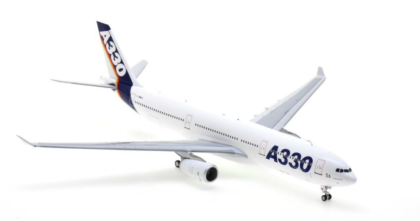 Front starboard side view of the 1/200 scale diecast model of the Airbus A330-300 prototype, registration F-WWKA in Airbus 'House Colours" circa the early 1990s - Inflight200 IF333AIRBUSKA