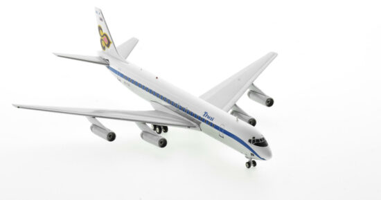 Front starboard side view of the 1/200 scale diecast model Douglas DC-8-62CF, registration HS-TGZ named "Srianocha" in Thai Airway's hybrid Scandinavian Airlines (SAS) livery circa 1984 - Inflight200 IF862TG0720