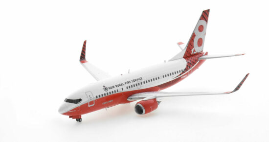 Front port side view of the 1/200 scale diecast model Boeing 737-300 registration N138CG, named "Marie Bashie" in New South Wales Rural Fire Service livery - Gemini Jets G2NSW994