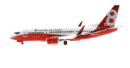 Port side view of the 1/200 scale diecast model Boeing 737-300 registration N138CG, named "Marie Bashie" in New South Wales Rural Fire Service livery - Gemini Jets G2NSW994