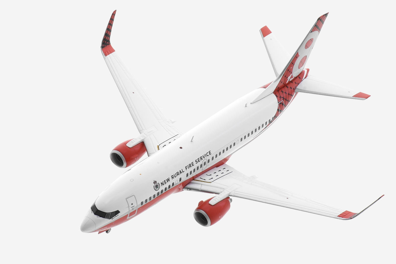 Top view of the 1/200 scale diecast model Boeing 737-300 registration N138CG, named "Marie Bashie" in New South Wales Rural Fire Service livery - Gemini Jets G2NSW994