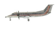 Port side view of the 1/200 scale diecast model Embraer EMB 120RT Brasilia, registration N137H, in Comair livery, circa the 1990s - Gemini Jets G2COM1022