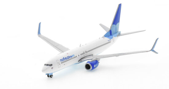 Front port side view of the 1/400 scale diecast model Boeing 737-800 NG, registration VP-BQG, in Pobeda Airlines livery - GJPBD2119