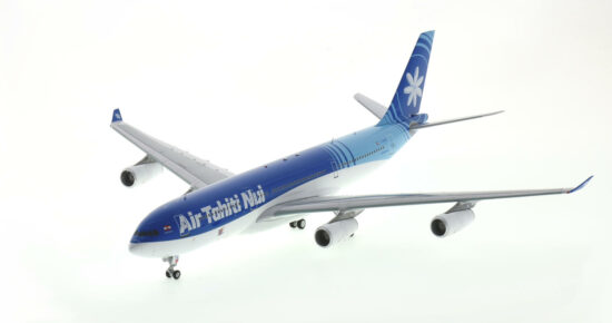 Front port side view of the 1/200 scale diecast model of the Airbus A340-200 registration F-OITN, named "Bora Bora" in Air Tahiti Nui livery, circa 2002 - IF342AV0623