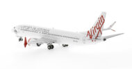 Rear view of the 1/400 scale diecast model of the Boeing 737-8 MAX registration VH-8IA,  named "Monkey Mia" in Virgin Australia livery - 88020
