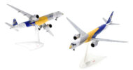 View of the model on display stand 1/200 scale diecast model Embraer E195-E2 (official model designation ERJ 195-400) registration PR-ZIJ named "Profit Hunter" in Embraers Golden Eagle livery - HE572064