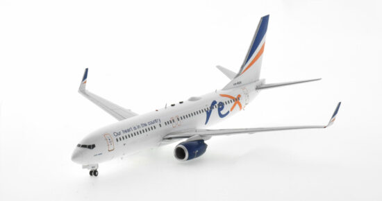 Front port side view of the 1/200 scale diecast model of the Boeing 737-800 NG, registration VH-REX, in Rex Airlines livery - Inflight200 IF738ZL0621