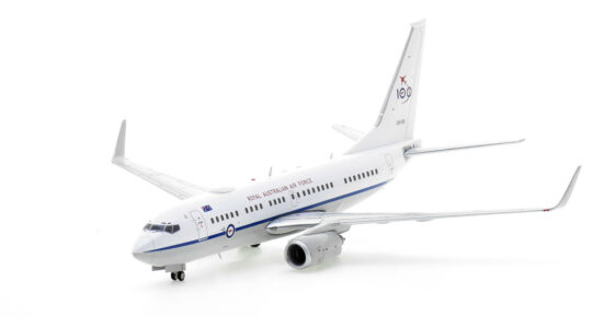 Front port side view of the 1/200 scale diecast model of the Boeing 737-7DF BBJ serial number A36-001 with the RAAF's "100 Years" anniversary tail logo assigned to No.34 Squadron, Royal Australian Air Force - Gemini Jets G2RAA1224