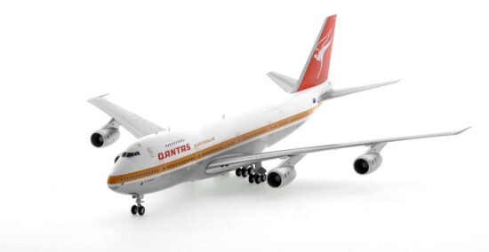 Front port side view of the 1/200 scale diecast model of the Boeing 747-200M registration VH-ECB  in Qantas Airways Ochre livery, circa 1980 - Gemini Jets G2QFA554