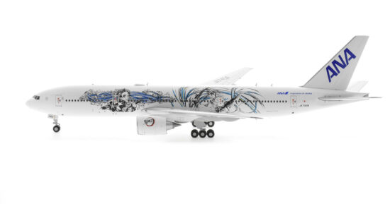 Port side view of the 1/200 scale diecast model Boeing 777-200ER of registration JA745A in All Nippon Airways (ANA) "Demon Slayer: Kimetsu no Yaiba" livery.